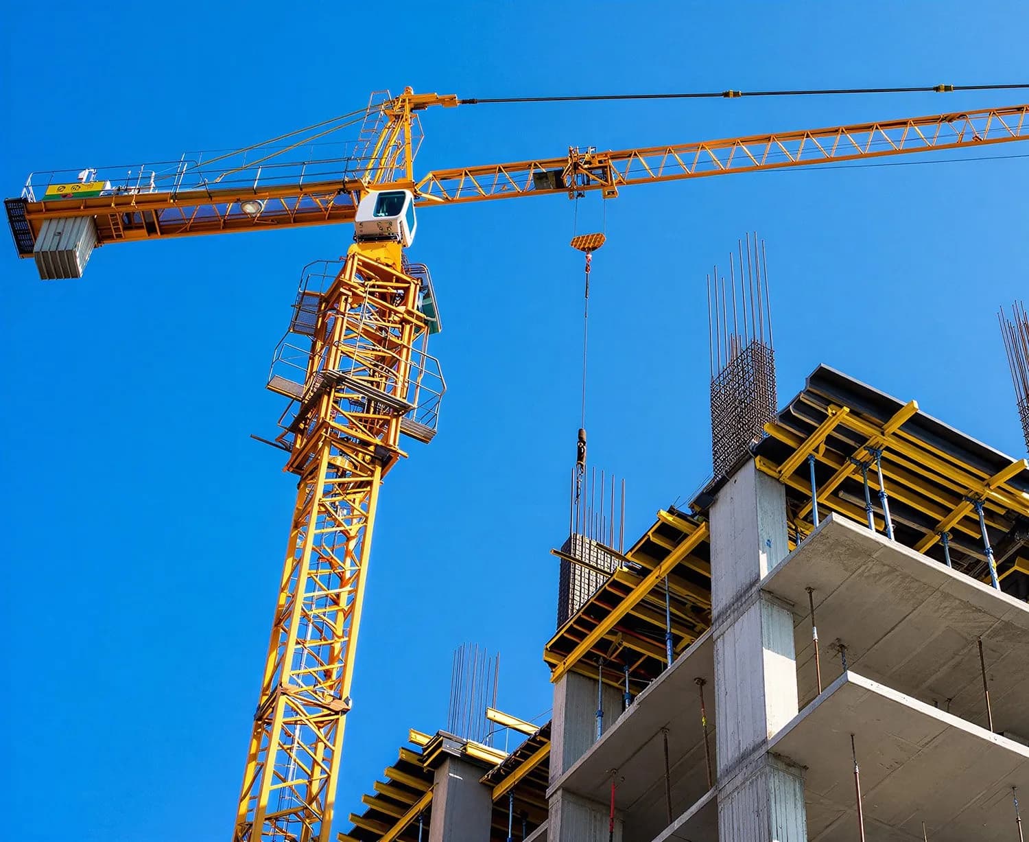 Tower crane above a building under construction